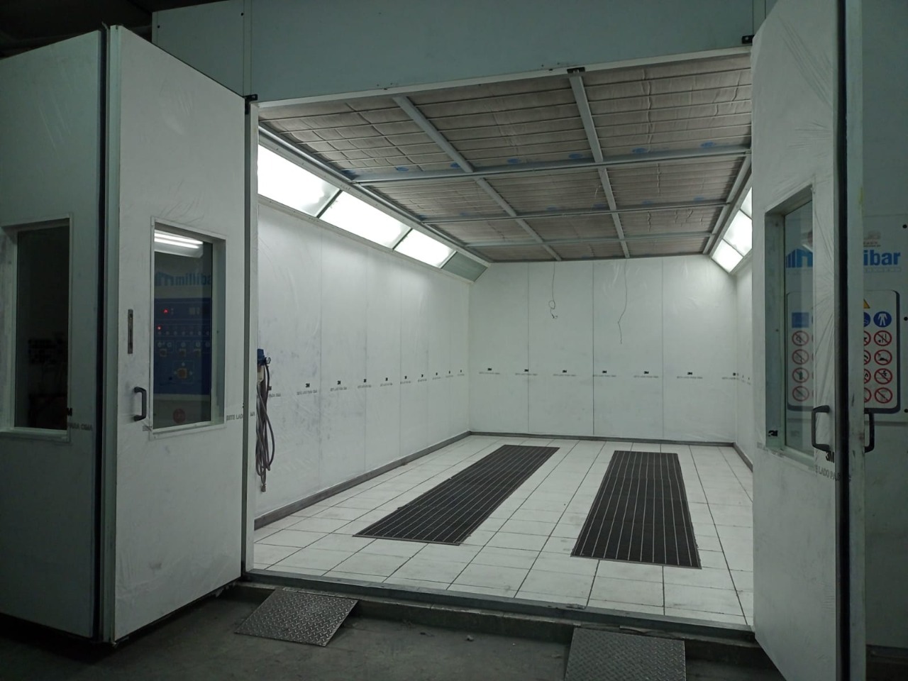 Dentro da Cabine de Pintura